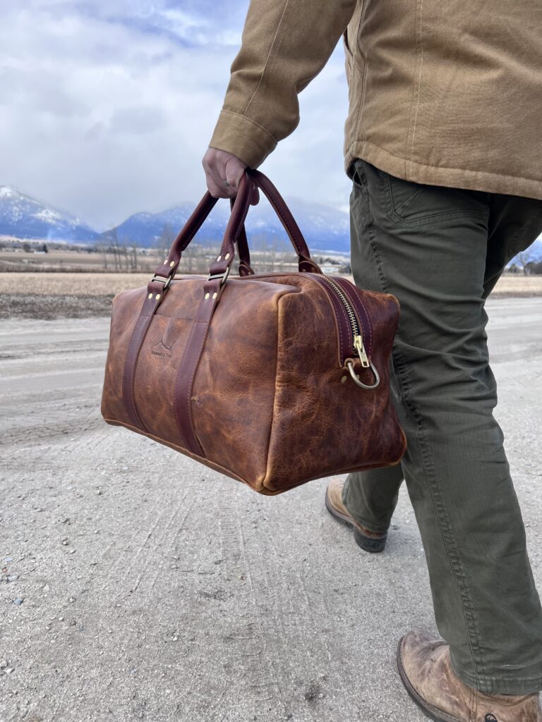 back of leather duffel bag