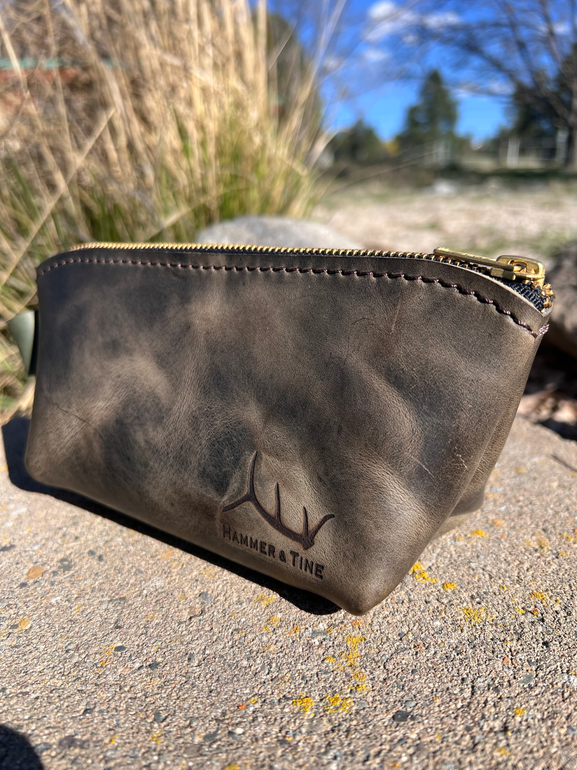 Small grey cosmetics bag